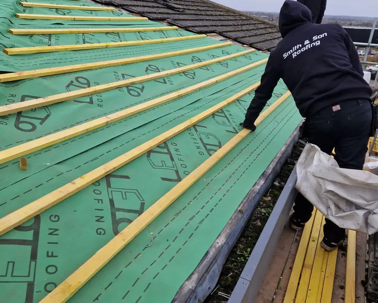 Full re-roof in progress on breathable membrane